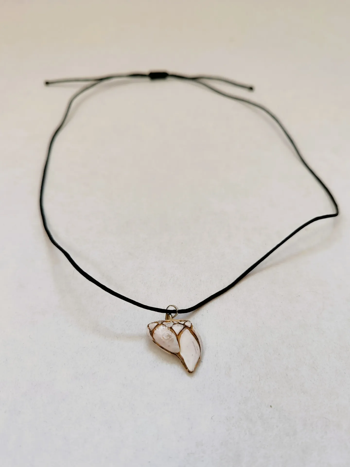 Collier pouce-pied
